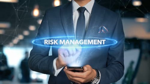 Businessman Smartphone Hologram Word Risk Management