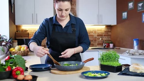 Woman Preparing Healthy Vegetables in Bright Kitchen