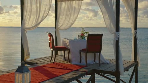 Table By Sea with Sweet Things Snacks Drinks for Banquet on Fresh Air Outdoors