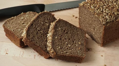 Sliced Whole Wheat Bread on Cutting Board
