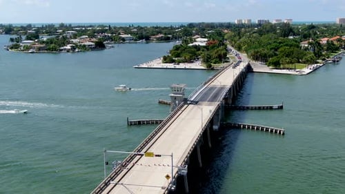 Aerial View of Street Bridge Crossing Ocean