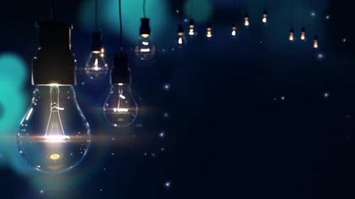 Elegant Hanging Light Bulbs with Shimmering Particles Background