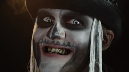Man with Skull Makeup and White Contact Lenses