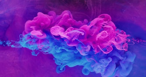 Pink and Blue Ink Swirling Clouds Abstract
