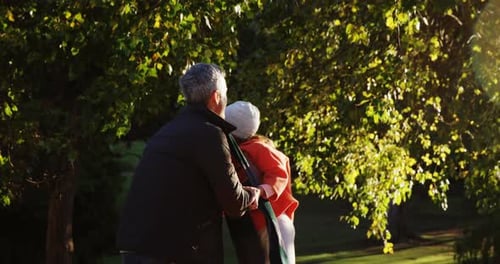 Loving Father and Daughter in Park