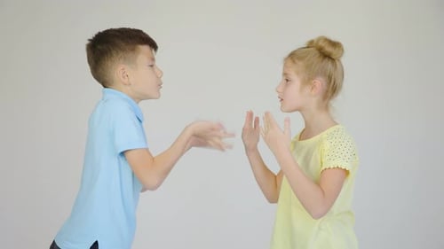 Children Playing Hand Game Indoors