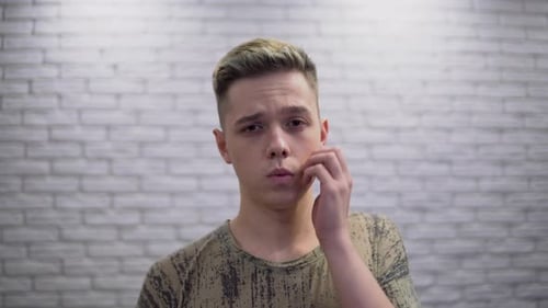 Close Up Teenage Guy with Acne and Problem Skin