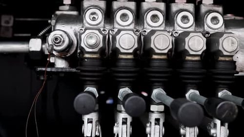 Compressor Control Unit and Levers for Lifting and Lowering Machine Parts