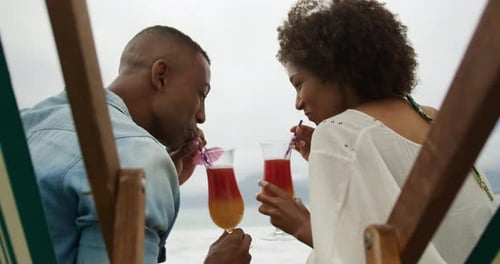 Couple enjoying free time by the sea
