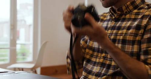 Millennial male professional working in a creative office