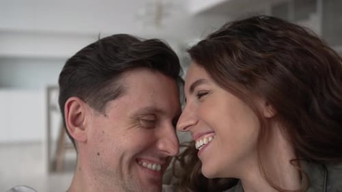 Loving Couple Kissing Intimately Indoors