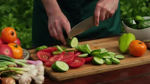Chopping Fresh Vegetables on a Cutting Board