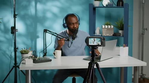 Man Recording a Podcast in Studio