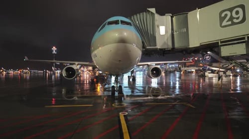 Night view of boarding Korean Air plane