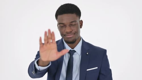 Young Adult in Suit Gesturing Stop