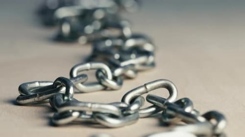 Close Up of Metal Chain Links on Surface