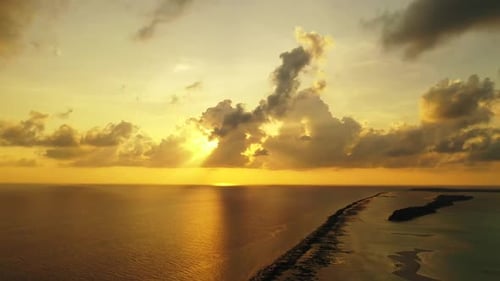 Aerial drone shot panorama of tranquil island beach lifestyle by blue water with white sand backgrou