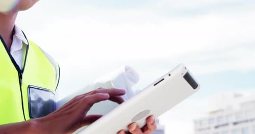 Architect using tablet computer