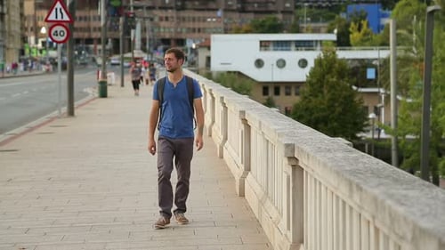 Middle-Aged Man Stops to Look at Famous City Landmark. Sightseeing in Europe
