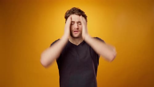 Worried Man Gesturing and Reacting