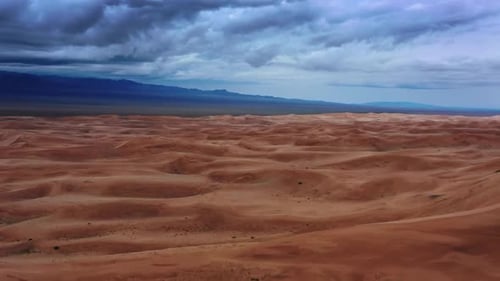 Sand Dunes with Storm Clouds in Gobi Desert