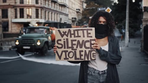 Afroamerican Girl in Black Bandana on Face