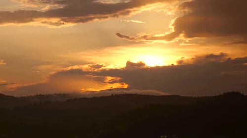 Dramatic Sunset Over Mountain Range