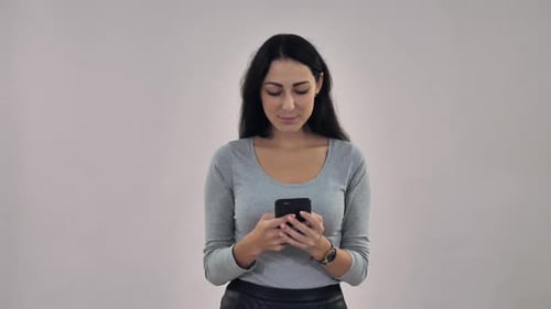 Young Adult Woman Using Cellphone