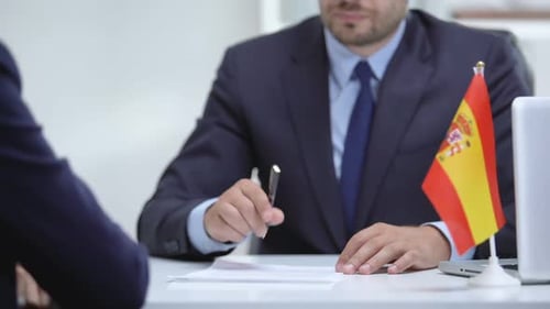 Signing Agreement with Spanish Businessman in Office