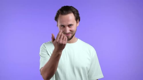 Handsome Man Showing Hey you Come Here