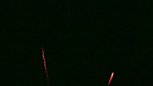 Colorful Firework display at night on sky background