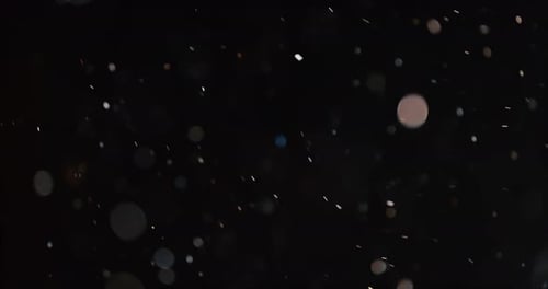 Bokeh à particules abstraites flottantes sur fond sombre