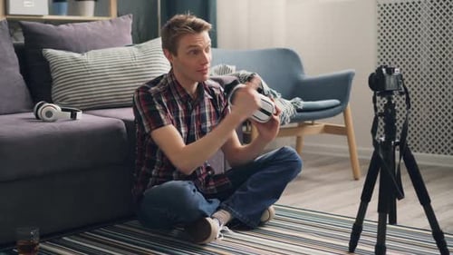 Adult Using VR Goggles for a Camera Blog