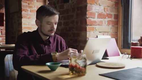 Male Book Writer Work in Cafe