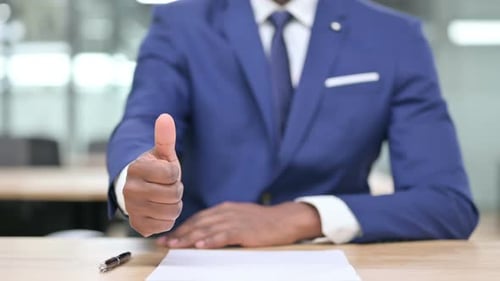 Hand of African Businessman Showing Thumbs Up
