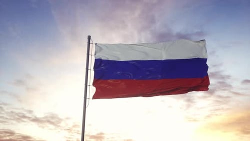 Waving Russian National Flag Against Sunset Sky