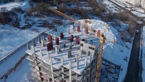 Aerial shot of building residental house on construction site.