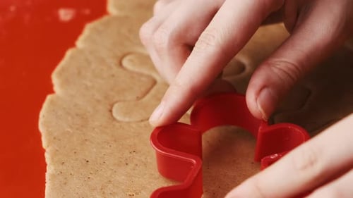 Shaping Festive Gingerbread Cookies for the Holidays