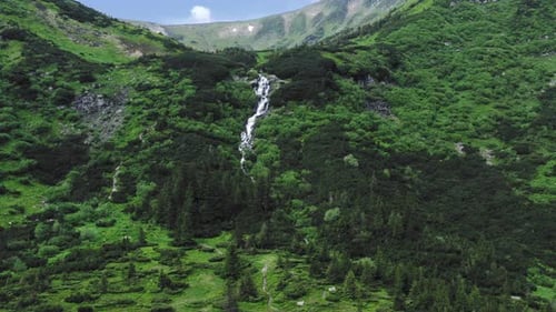 Aerial View Of A Plateau Waterfall High Mountain Range Surrounding