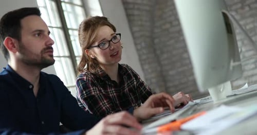 Business People and Colleagues Brainstorming and Working in Office