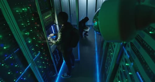 Surveillance Camera Capturing Hackers in Server Room