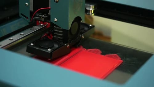 3D Printer Creating Red Object Close Up