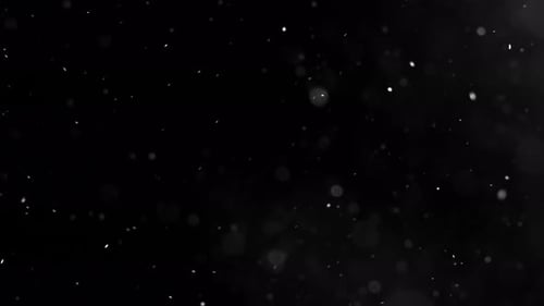 Eine Suspension von Weiß-Silber-Partikeln in der Luft