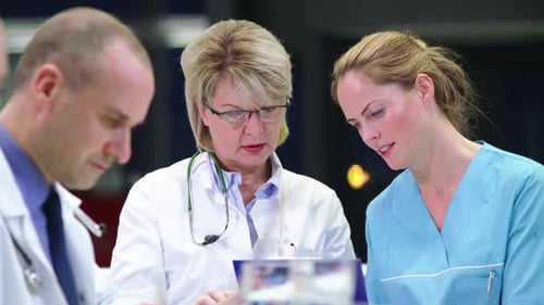 Medical Professionals Meeting in a Hospital Setting