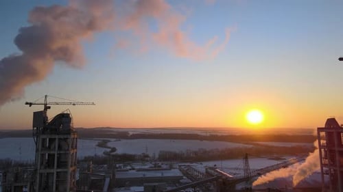 Aerial View of Cement Factory with High Concrete Plant Structure and Tower Crane at Industrial