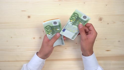 Hands grabbing money from another hands