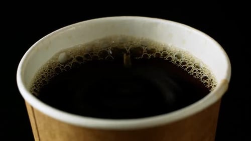 Close Up of Steaming Black Coffee in Cup