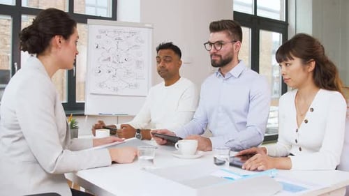 Diverse Business Team Meeting in Modern Office