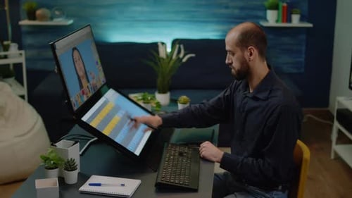 Digital Artist Editing Portrait at Home Workplace