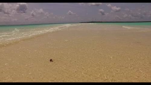 Aerial top down travel of luxury seashore beach vacation by blue sea with bright sand background of